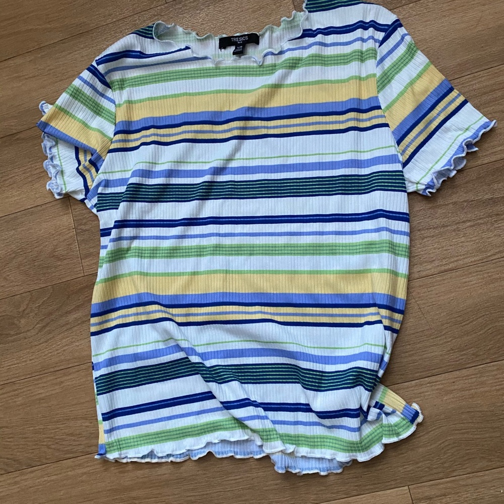 Sort of a small T-shirt, fits well, great conditio